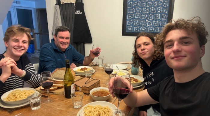 EM Normandie students at a local man's house sharing a meal